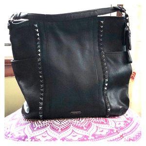 Coach black stud pebbled leather handbag